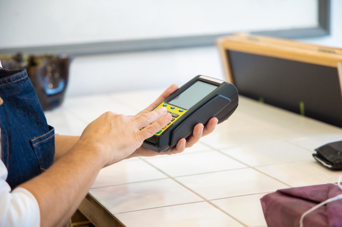 Point-of-sale terminal in use at a retail counter
